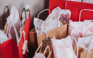 christmas presents wrapped in gift bags