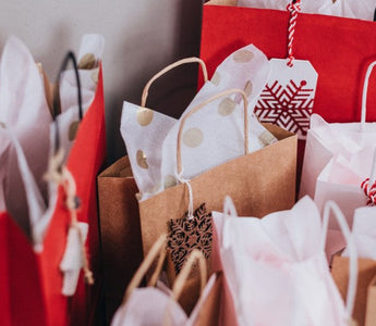 christmas presents wrapped in gift bags